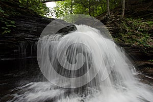 Scenic Waterfall in Ricketts Glen State Park in The Poconos in P