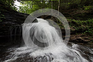 Scenic Waterfall in Ricketts Glen State Park in The Poconos in P