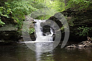 Scenic Waterfall in Ricketts Glen State Park in The Poconos in P