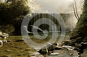 Scenic waterfall stream in silky effect.