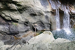 Scenic waterfalls in in underground cave