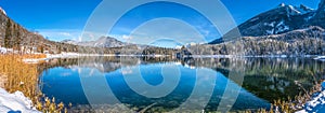 Scenic winter landscape in Bavarian Alps with idyllic mountain lake Hintersee photo