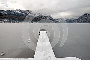 Scenic winter landscape with frozen lake