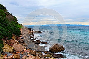 Scenic winter landscape of Glyfada Beach in Athens. Saronic Gulf. Famous public beach. Natural composition.