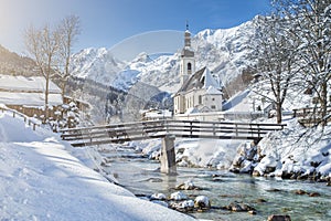 Scenic winter landscape with pilgrimage church in the Alps