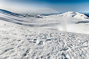 Scenic winter landscape with snow covered mountains, Campocatino, Italy