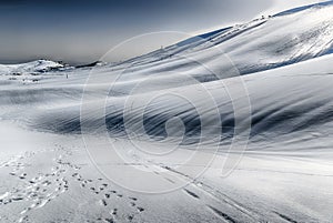 Scenic winter landscape with snow covered mountains, Campocatino, Italy