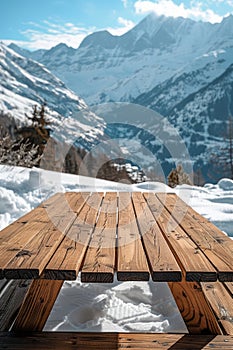 Scenic Winter Landscape with Wooden Table Overlooking Snow Covered Mountains and Valley