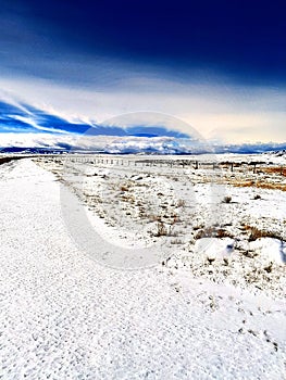 Scenic winter mountain landscape in the backroads of Laramie , Wyoming photo