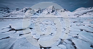 Scenic winter seascape of sea and fjords frozen rocky norge coast mountains peaks Lofoten islands, Norway