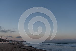 Scenic Zuma Beach vista at dusk, high tide, Malibu, California