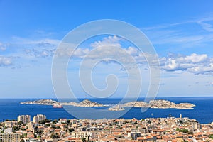 A scenics aerial view of the city of Marseille, bouches-du-rhone, France with a cruise ship and rocky island in the background at