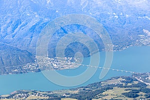 A scenics aerial view from the mountain of the of Savines-le-Lac, hautes-alpes, France town and valley with beautiful lake and