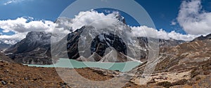 Scenics view of cholatse 6,440 m and taboche 6,542 m path of mahalangur himal with Chola lake near zongla village at khumjung