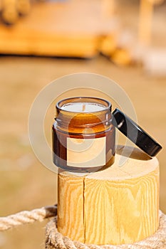 Scented candles on a wooden pole