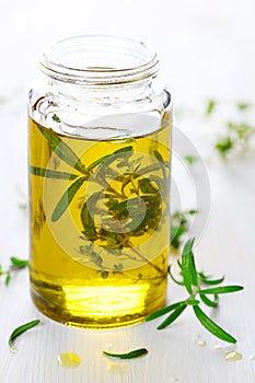 Scented oil with rosemary and fresh herbs