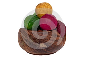 Scented wooden balls. Closeup of the air freshener in a brown wooden bowl made of wooden balls   and aromatized with essential