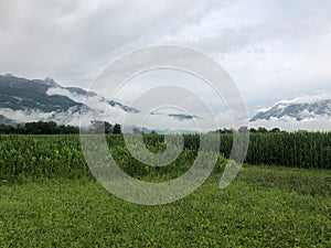 SCHAAN, LIECHTENSTEIN, AUGUST 4, 2021 Bad weather over a green field