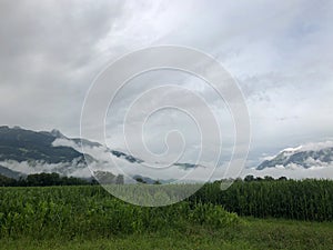 SCHAAN, LIECHTENSTEIN, AUGUST 4, 2021 Bad weather over a green field