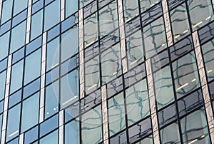 Schaerbeek, Brussels Capital Region - Belgium - The Brussels North WTC towers reflecting in rectangular windows