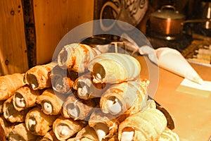 Schaumrollen, or Schillerlocken, are an Austrian confection.They consist of a cone or tube of pastry