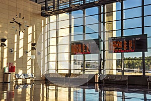 Schedule boards at railway station hall.