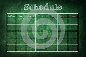 Schedule on chalkboard