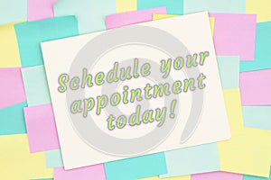 Schedule your appointment today type message on card with sticky notes