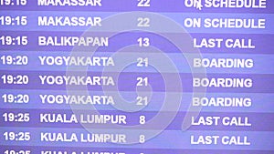 Scheduled departures flight screen in Asian airport