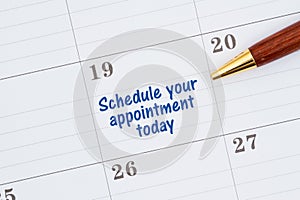 Scheduling your appointment today on a monthly calendar photo