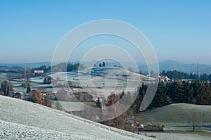 Scheidegg, Germany - 2019, December 07: Snow over a little town in Bavaria.