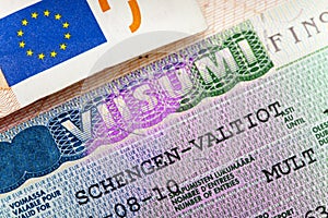 Schengen visa of Finland on the page of the passport,