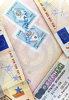 Schengen visa of Greece on the page of the passport and the euro