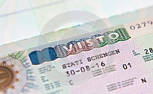 Schengen visa in the passport for a trip to Italy