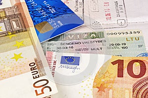Schengen visa in your passport, bank card and money banknotes