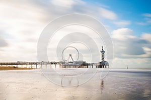 Beautiful day at Scheveningen beach, Netherlands with famous Pie