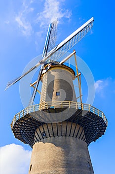 Schiedam, South Holland. The Netherlands, 06-12-2020. Traditional Dutch windmill that produces energy through water
