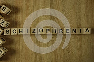 Schizophrenia word from wooden blocks photo