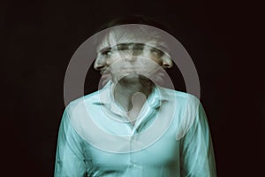 schizophrenic abstract blurry portrait of a man with mental disorders and mental illnesses photo