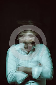 schizophrenic blurred portrait of a psychopathic man with mental disorders and disorders photo