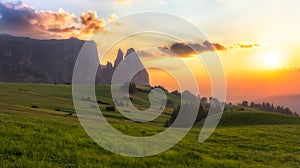 Schlern mountain with pasture at sunset, South Tyrol, Italy