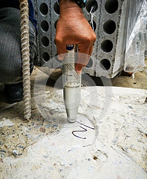 Schmidt hammer test on concrete pile