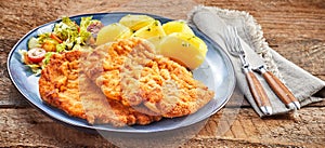 Schnitzel with boiled potatoes