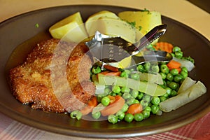 Schnitzel, pork escalope in beer gravy