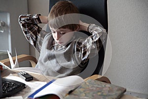 Scholar making his home work