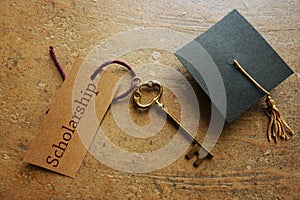 Scholarship key and cap