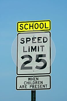 School and 25 mph sign