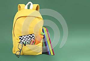 School acessories,yellow backpack with school supplies