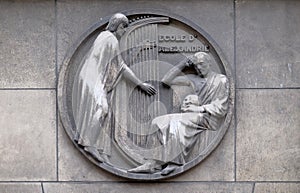 School of Alexandria. Stone relief at the building of the Faculte de Medicine Paris