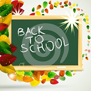 School autumn background with blackboard and leves